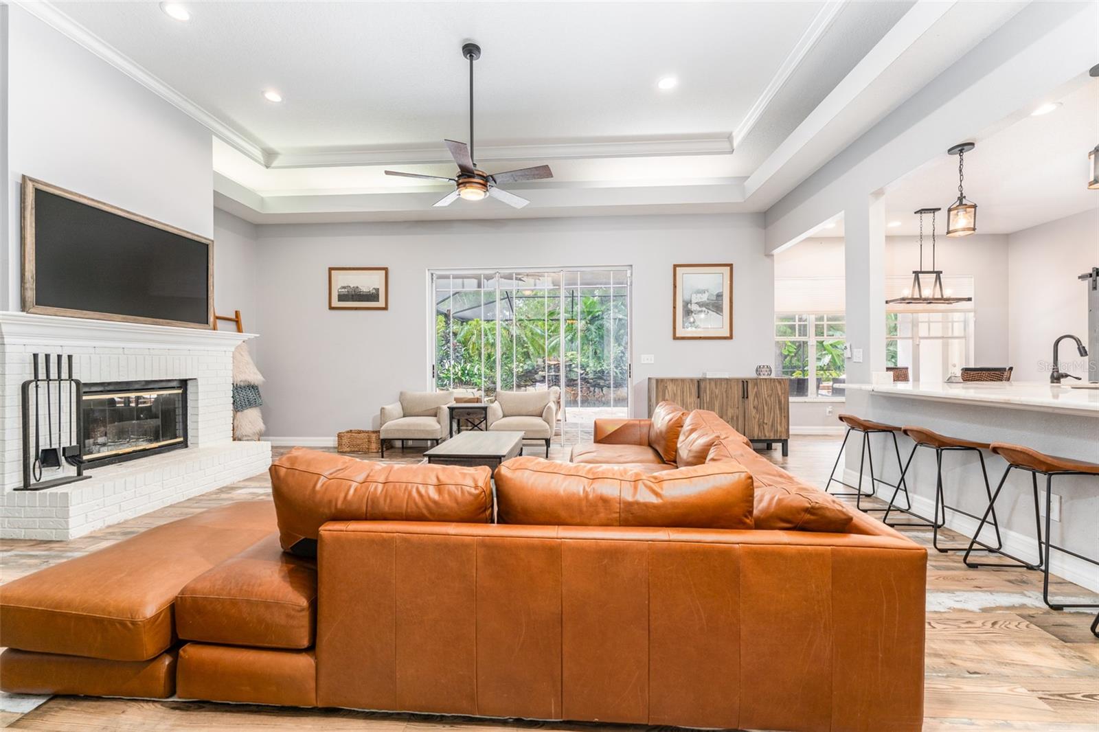 Expansive Great Room with Coffered Ceiling & Recessed Lighting