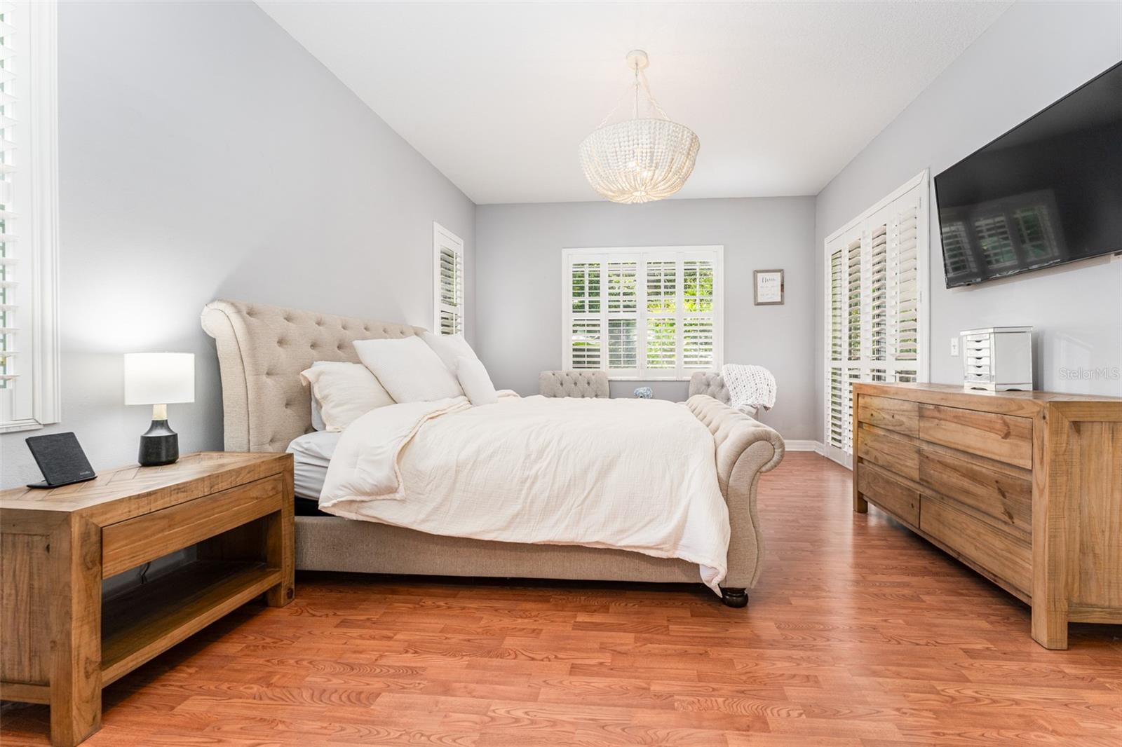 Primary Suite with 2 Walk in Closets & Sliders to Outdoor Living Area