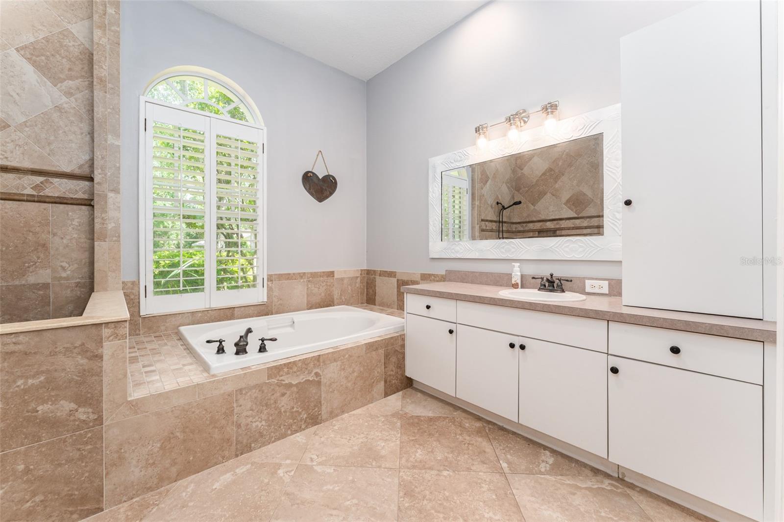 Primary Bath with Soaking Tub, Walk in Shower & Dual Vanities