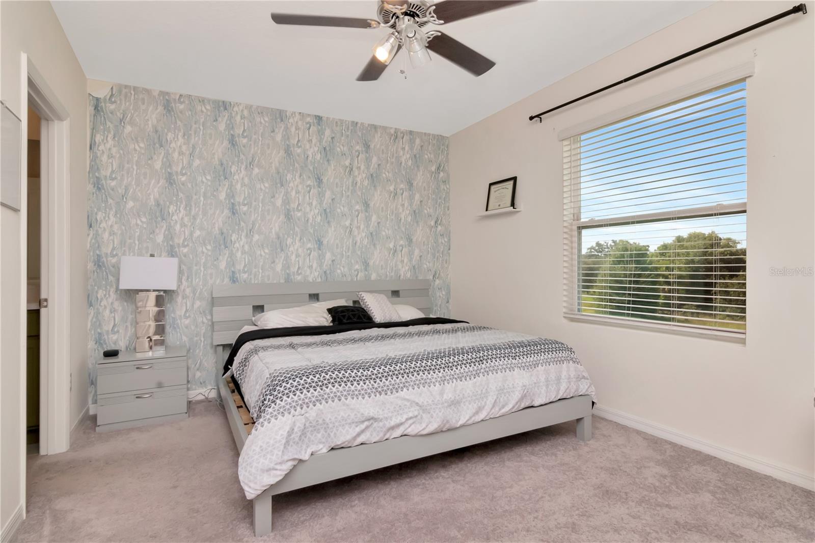Spacious Primary Bedroom with Accent Wall