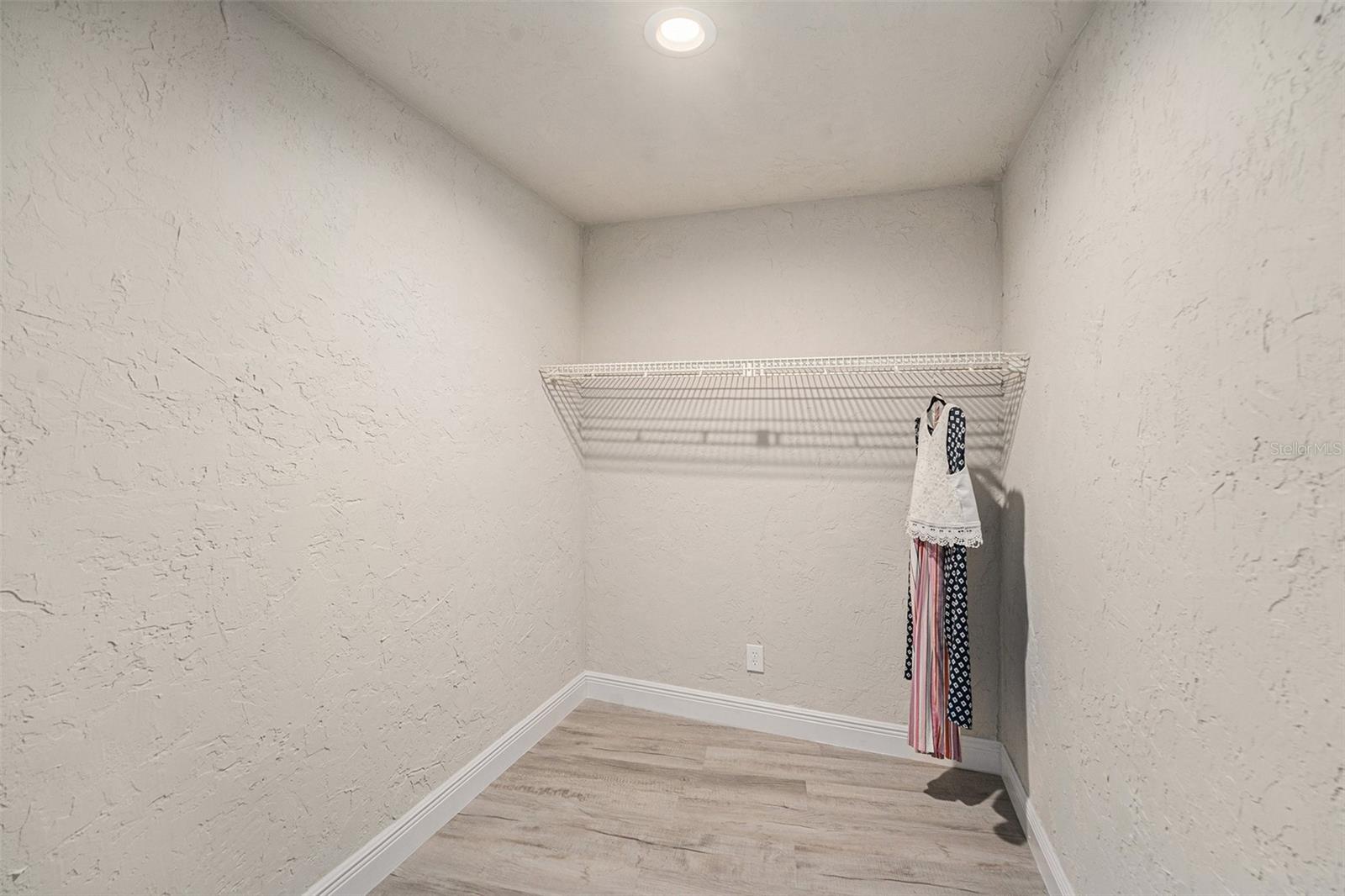 walk in closet in Primary bedroom