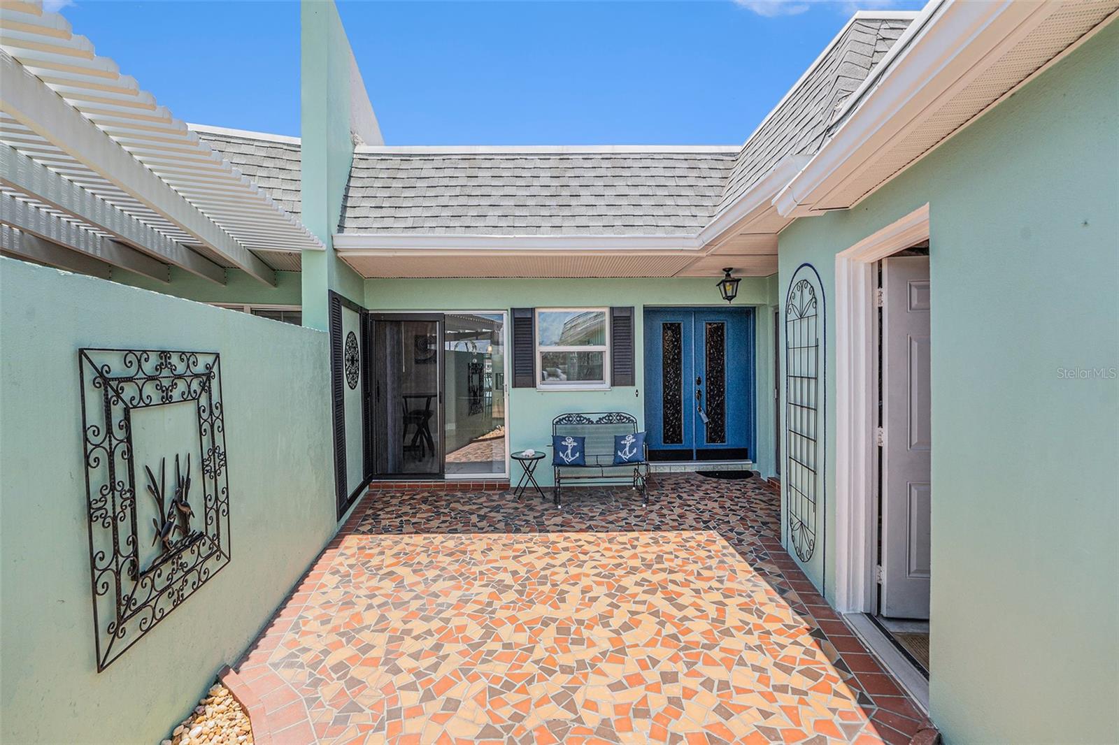 your Private Courtyard With access to the garage, front door and sliding door to kitchen from here.