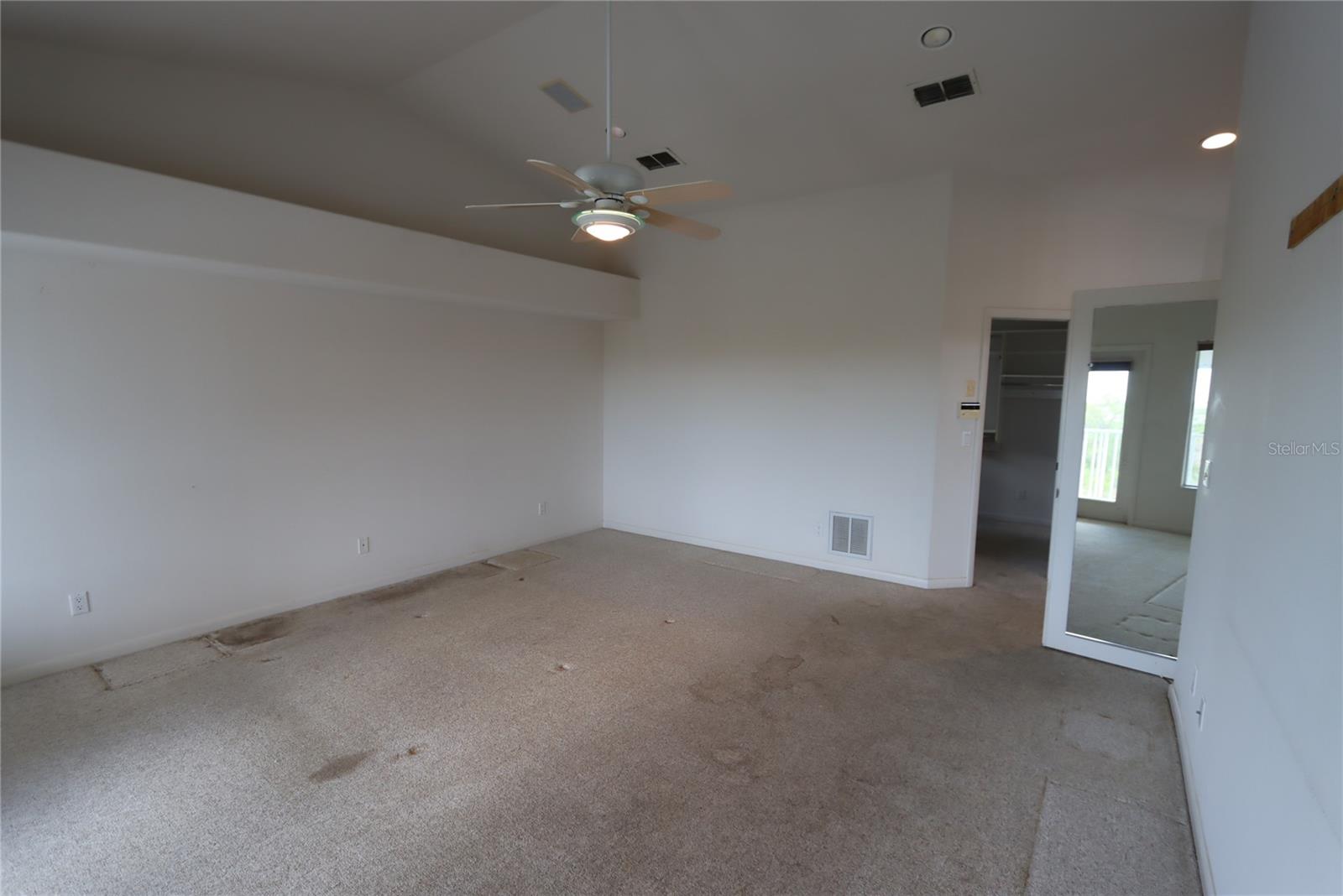 Primary Bedroom facing walk-in closet