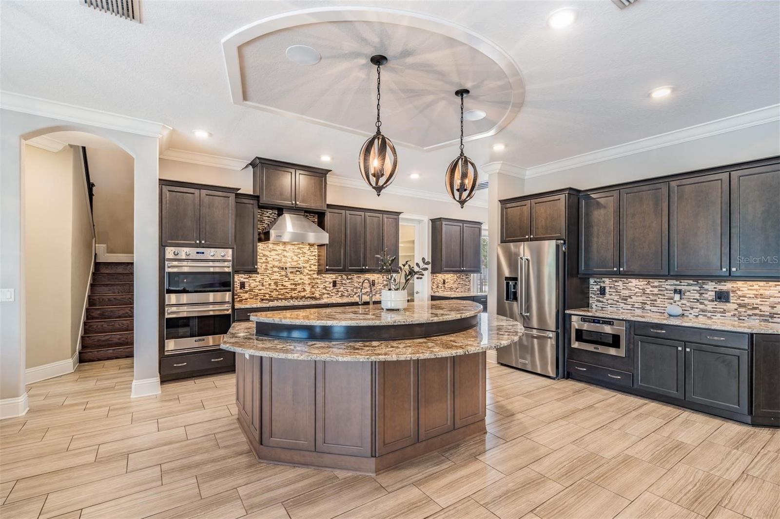 Storage cabinets are even tucked away under the center island!
