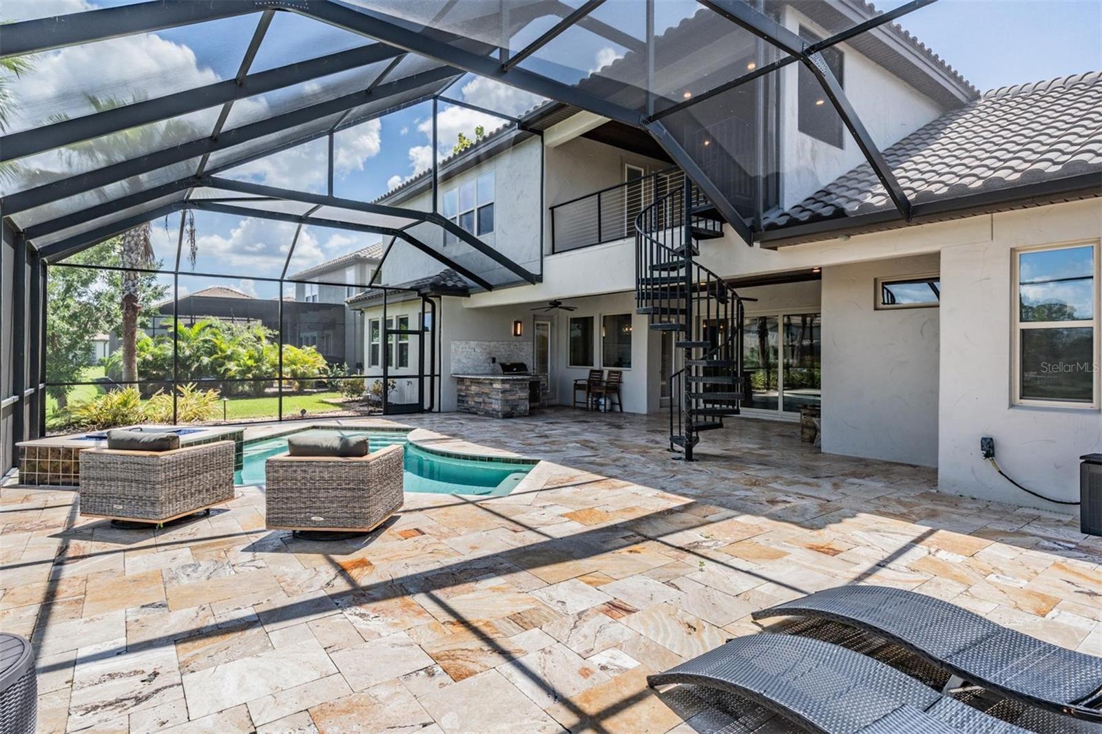 Upper and lower covered lanais are completely screened in!