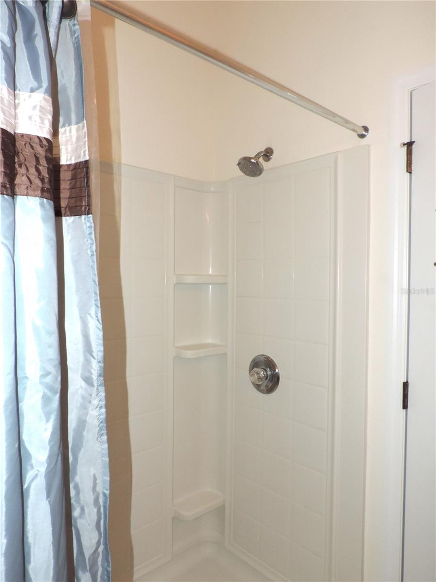 Primary bedroom walk in shower