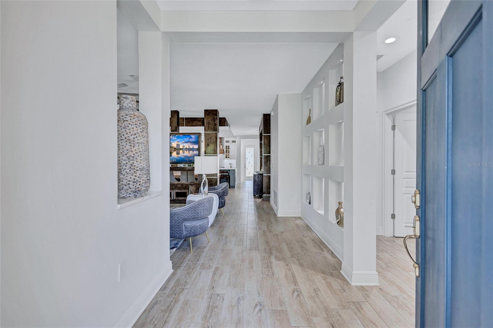 Walking through front door looking at back yard entrance