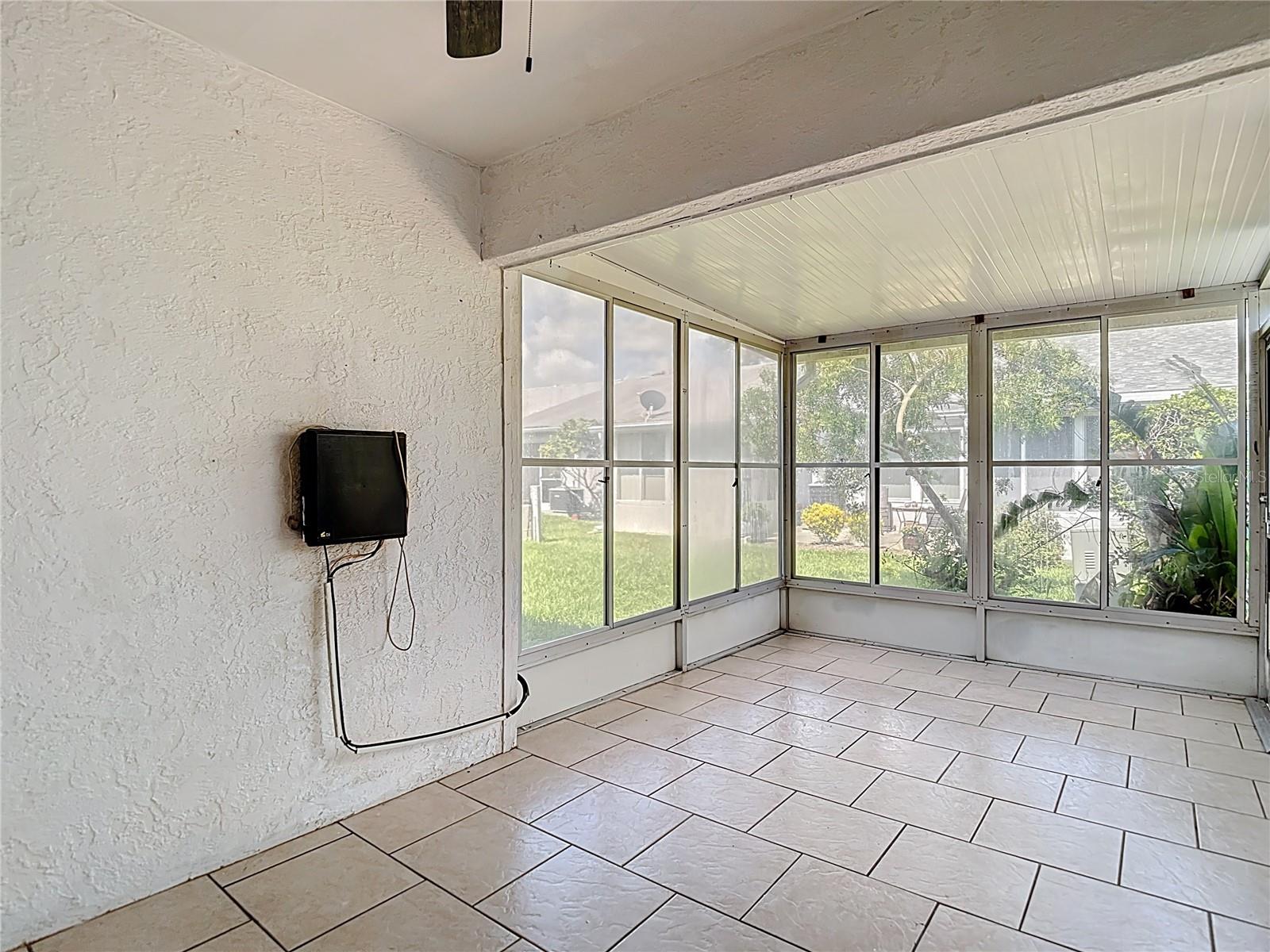 Rear enclosed screen room