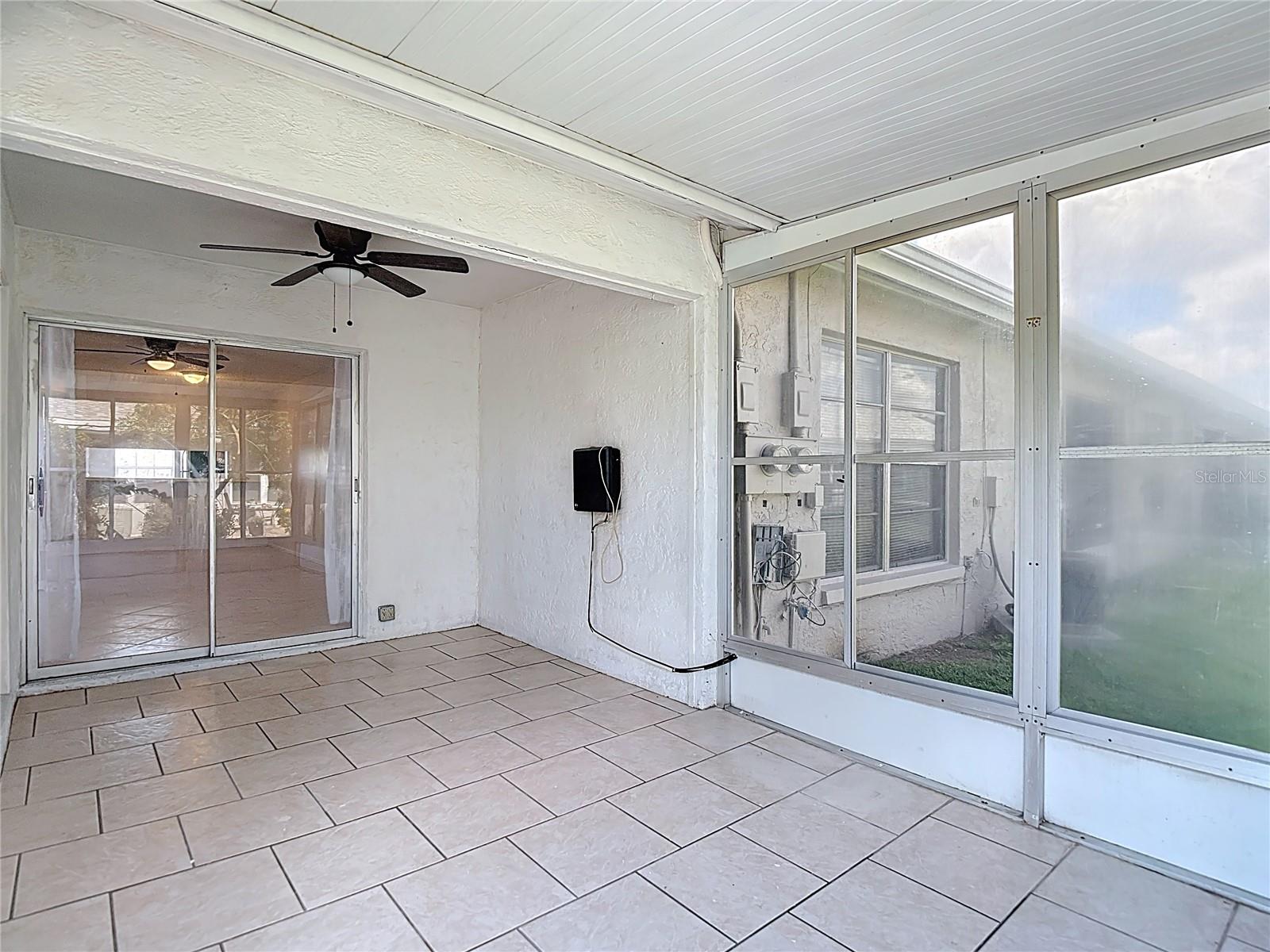 Rear enclosed screen room