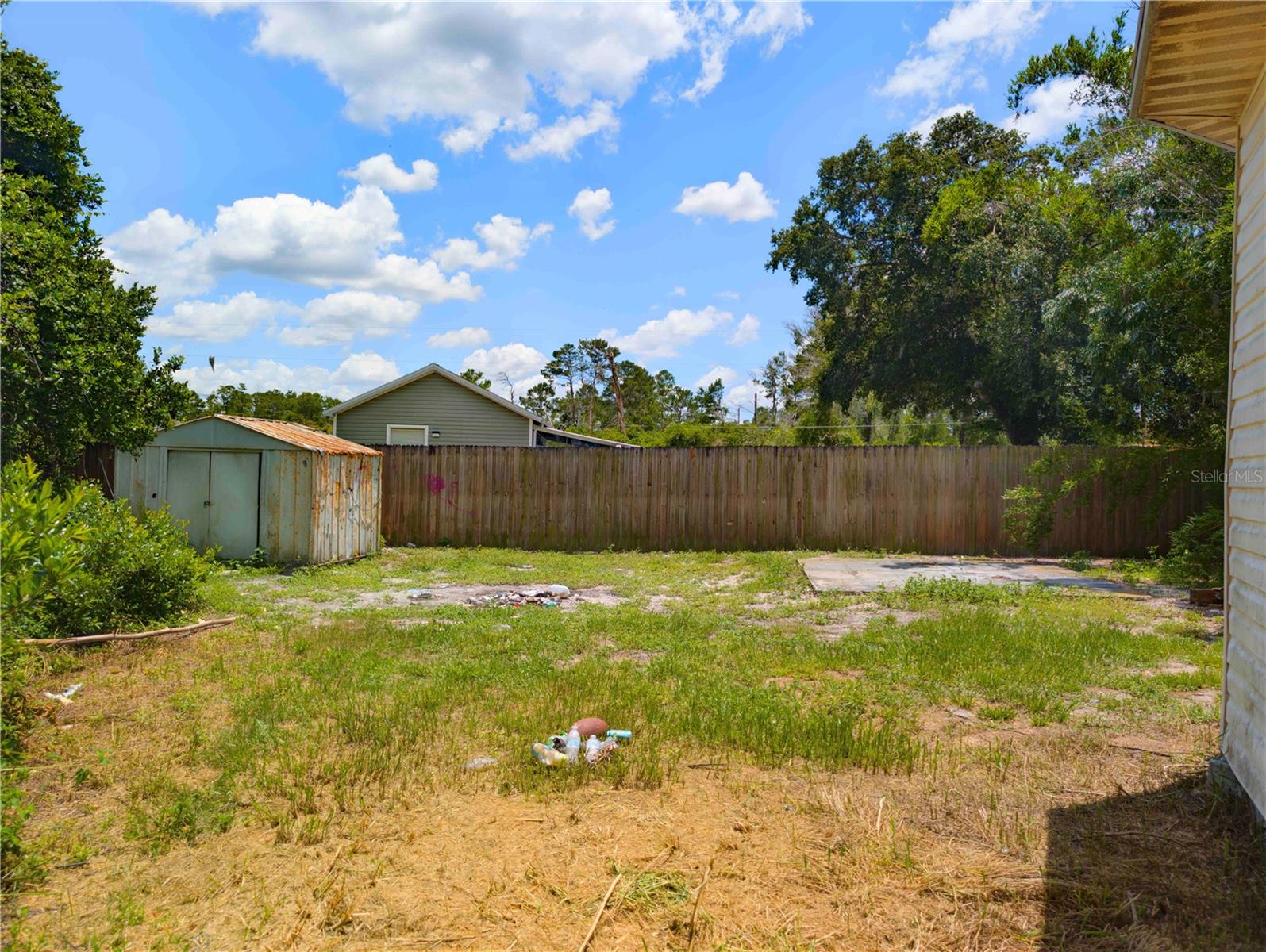 fenced back of the yard