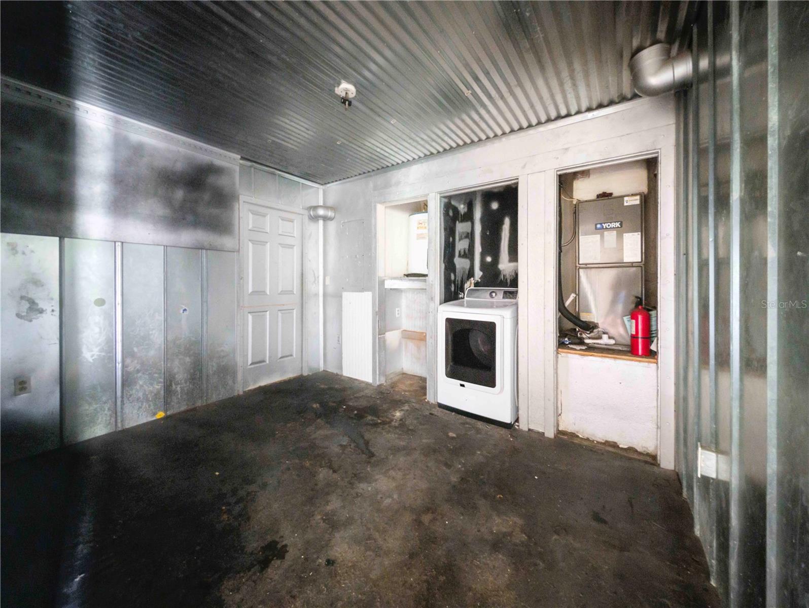 Bedroom with washer