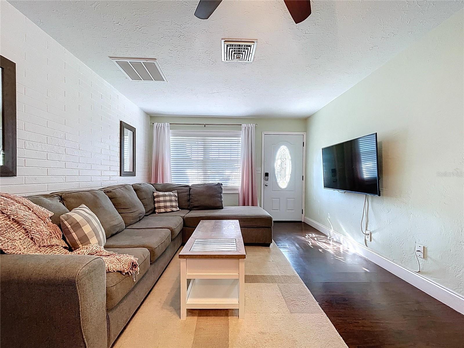 Natural light fills the living room
