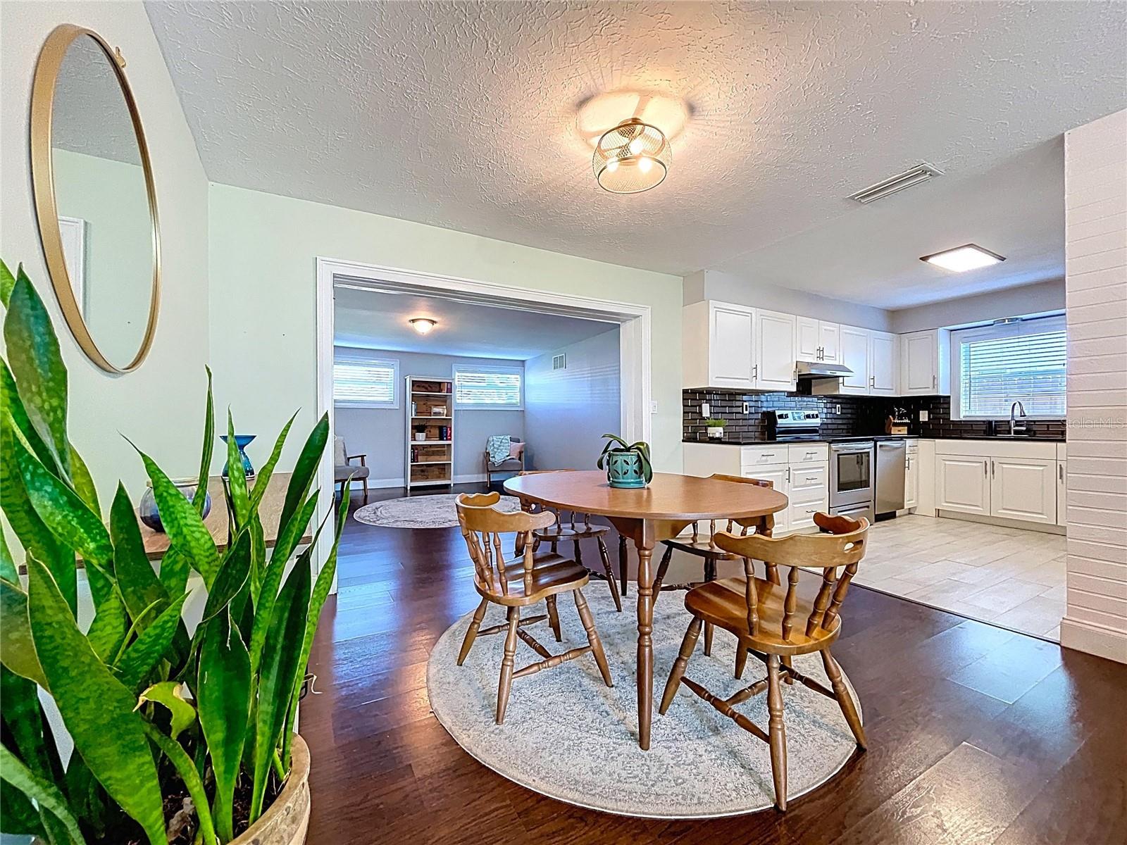 The dining room offers space for medium to larger 6-8 seat tables.