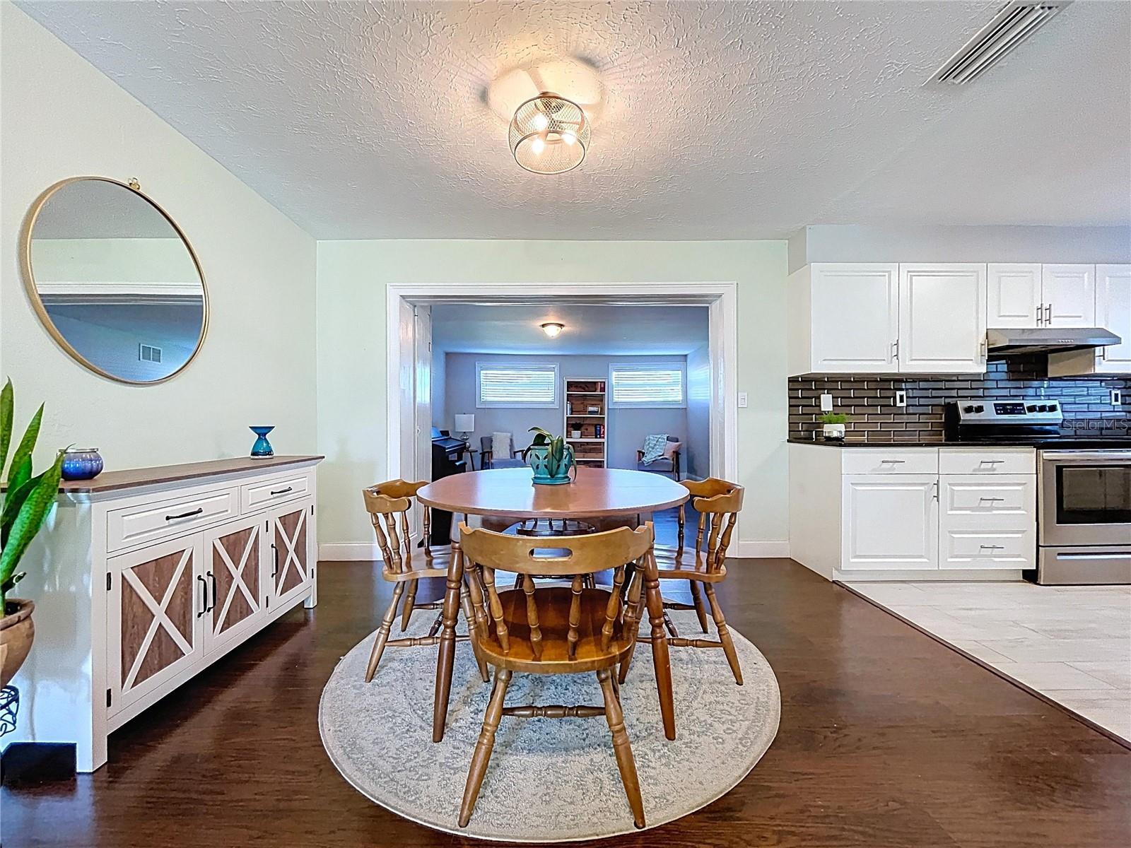 The dining room offers space for medium to larger 6-8 seat tables.