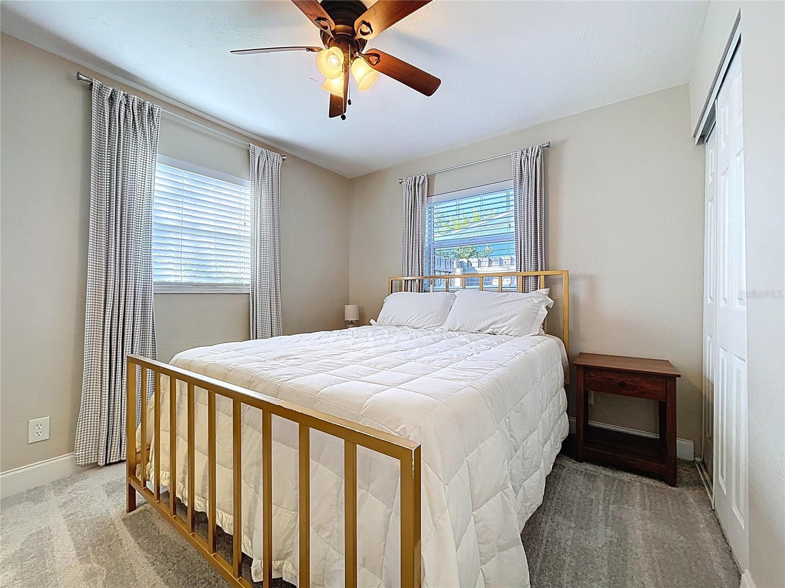 The primary bedroom offers an en-suite bathroom and plenty of natural light.