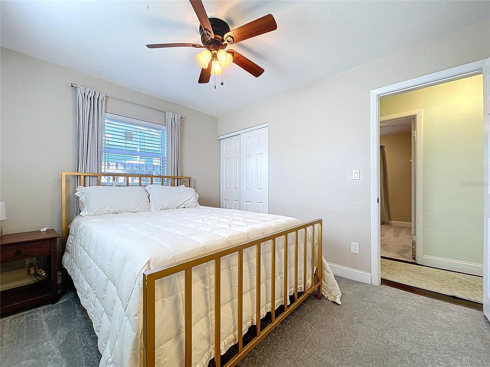 The primary bedroom offers an en-suite bathroom and plenty of natural light.