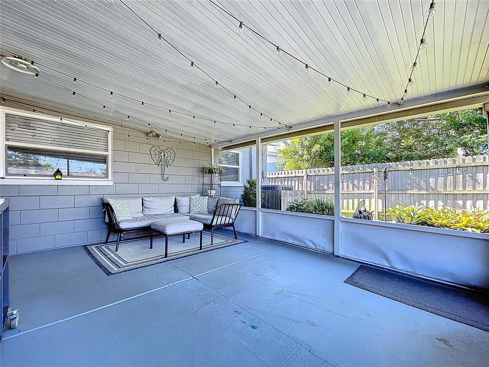 Great outdoor space on the 15x12 screened in lanai with TV and lighting included.
