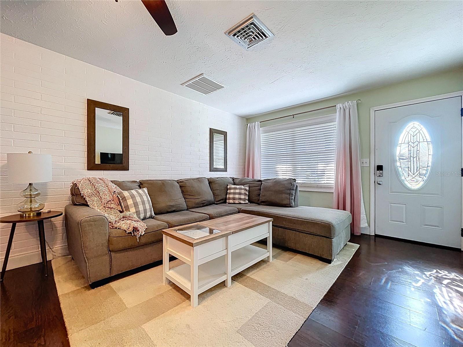 Natural light fills the living room.