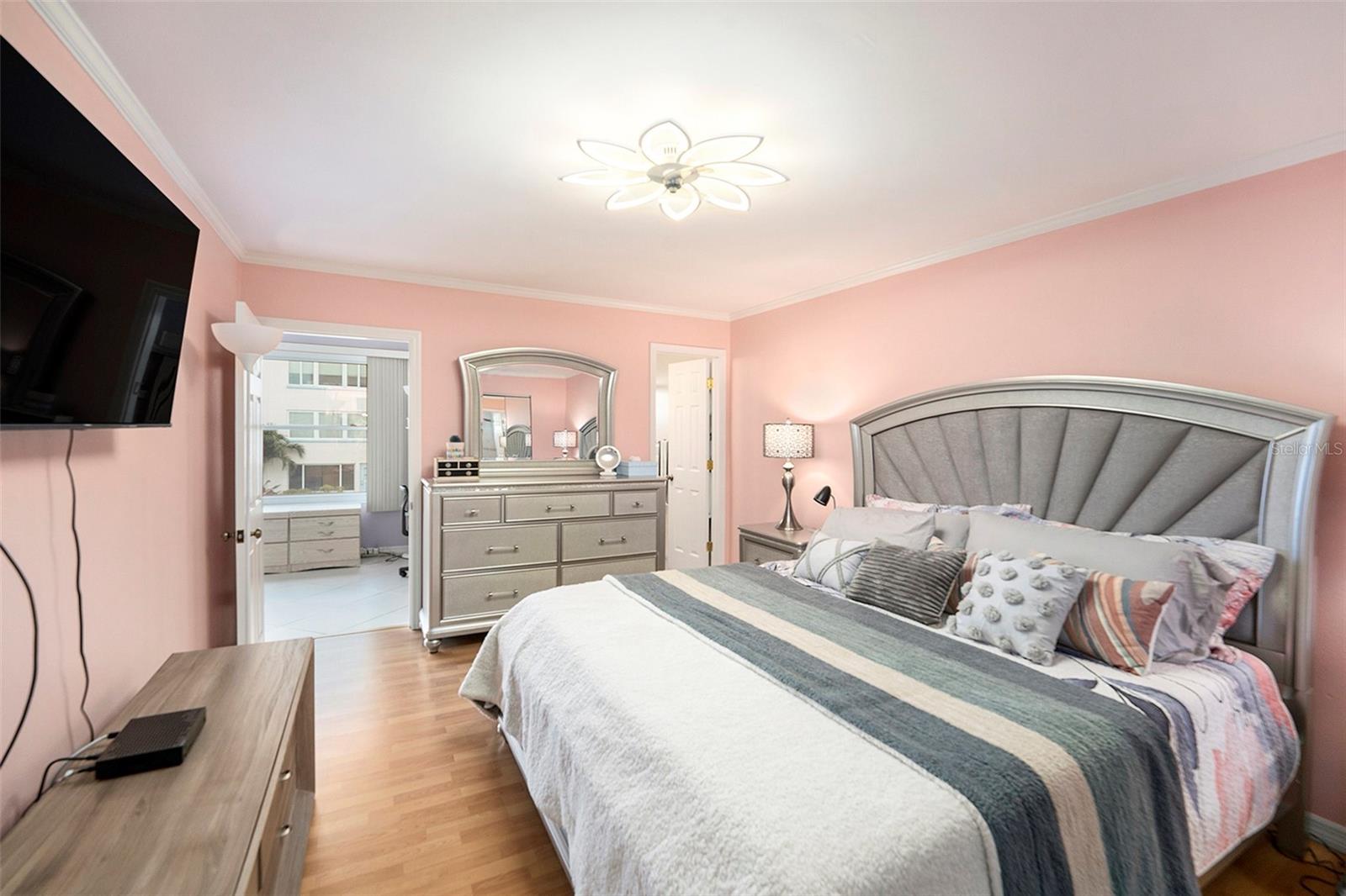 Gorgeous primary bedroom has en-suite private bath
