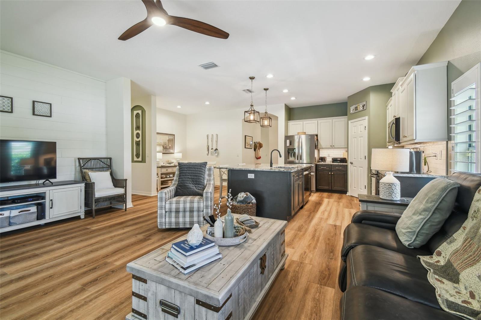 Living room overlooking the kitchen and breakfast nook