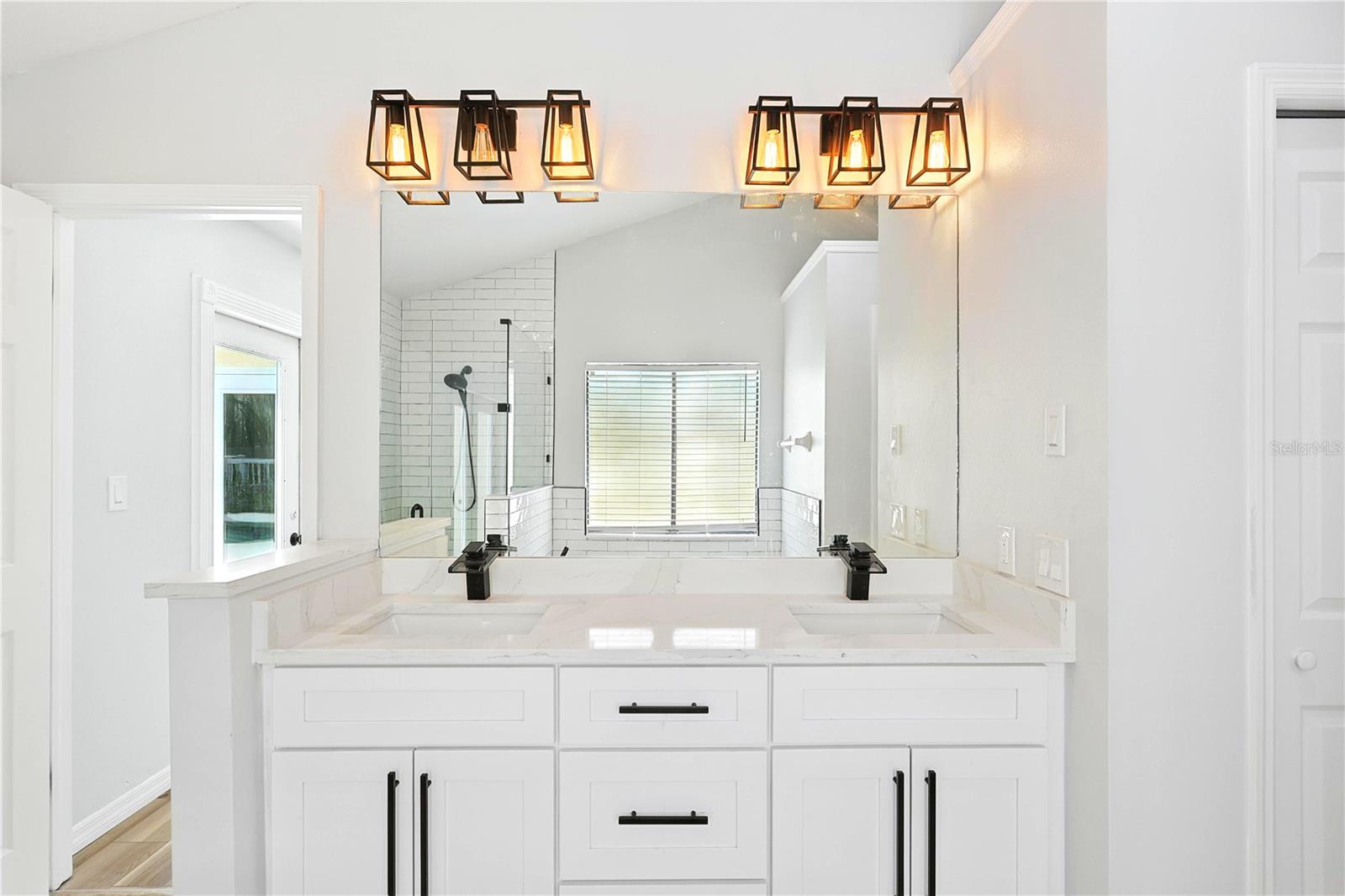 Primary bath double vanity with quartz countertops