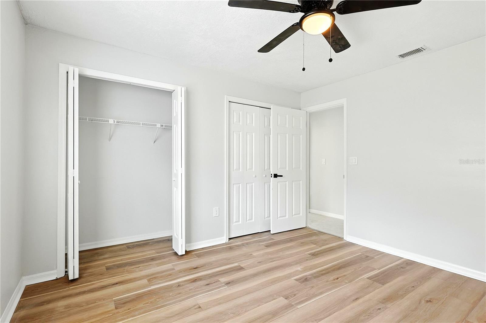 Second bedroom with new luxury laminate flooring