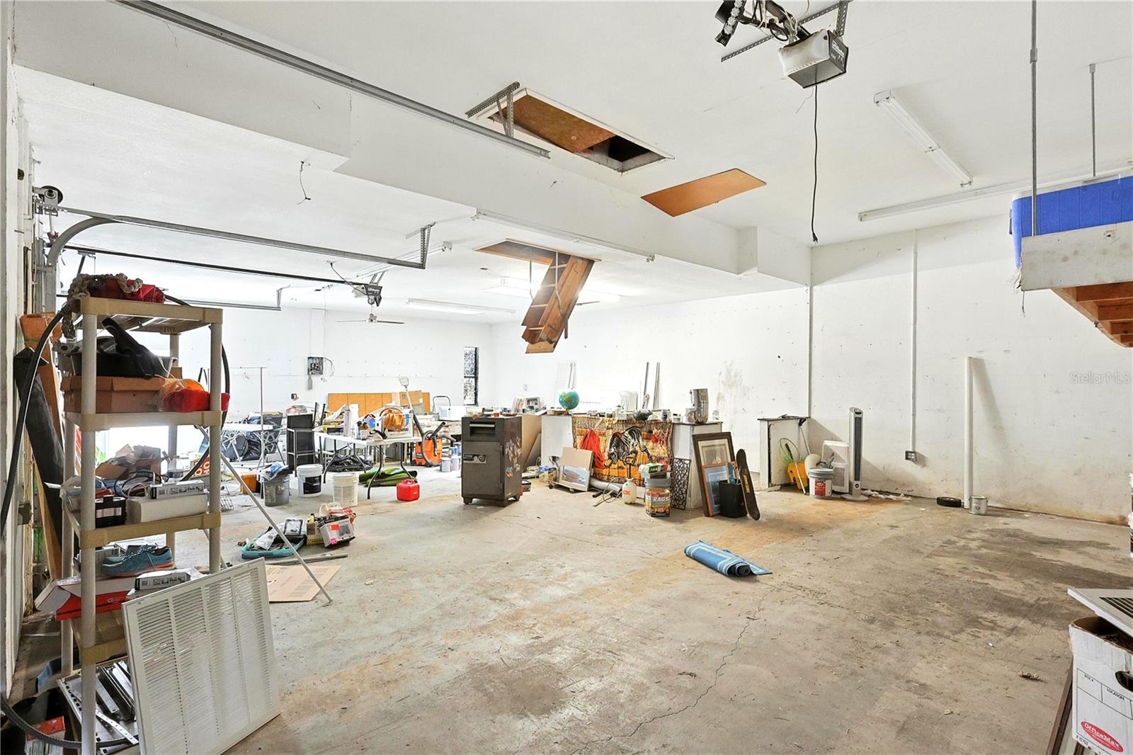 Oversized, detached garage with attic space will be emptied prior to close