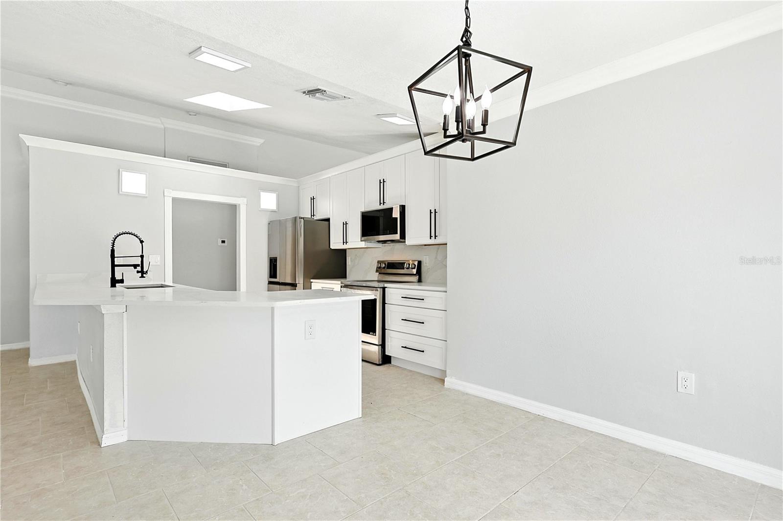 Eating breakfast area looking into kitchen