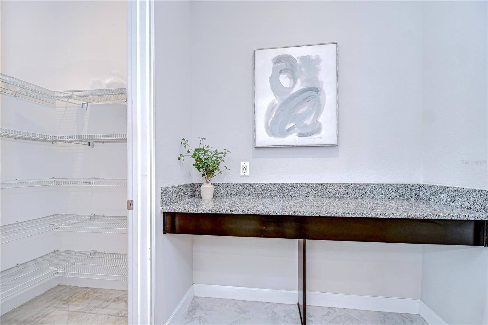 Drop Zone and Walk-in Pantry as you come in from the garage.