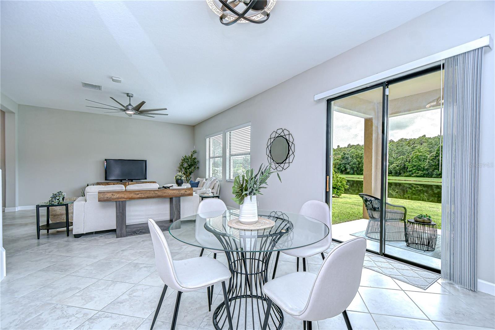 Kitchen and Family Room open to the amazing backyard