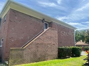 Back staircase that takes you out to the garden and swimming pool area.