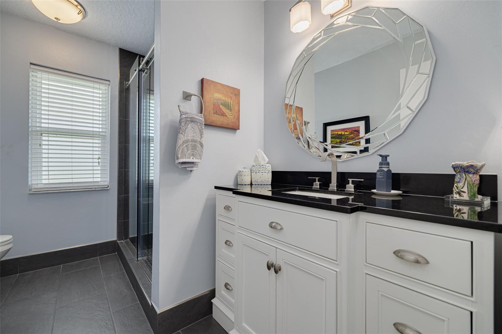 Updated guest bathroom with walk in shower