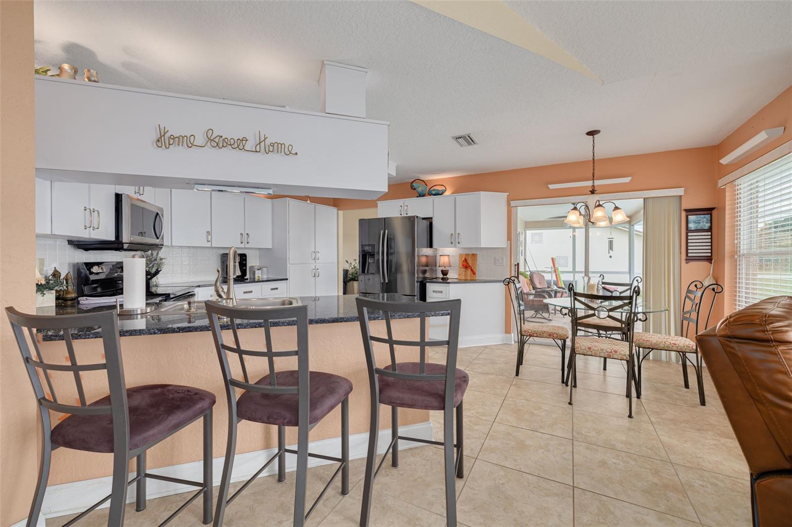 Kitchen with Breakfast bar and eat in smaller dining room