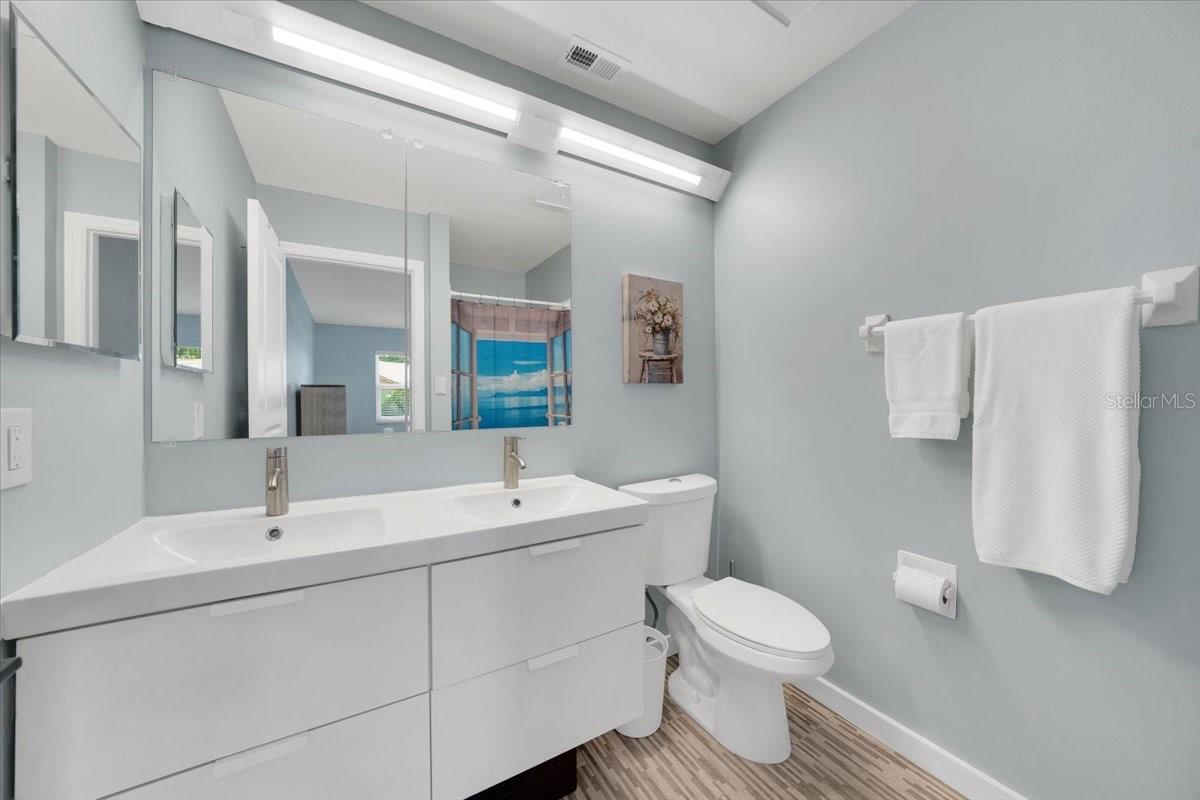 Updated master bathroom with dual vanities