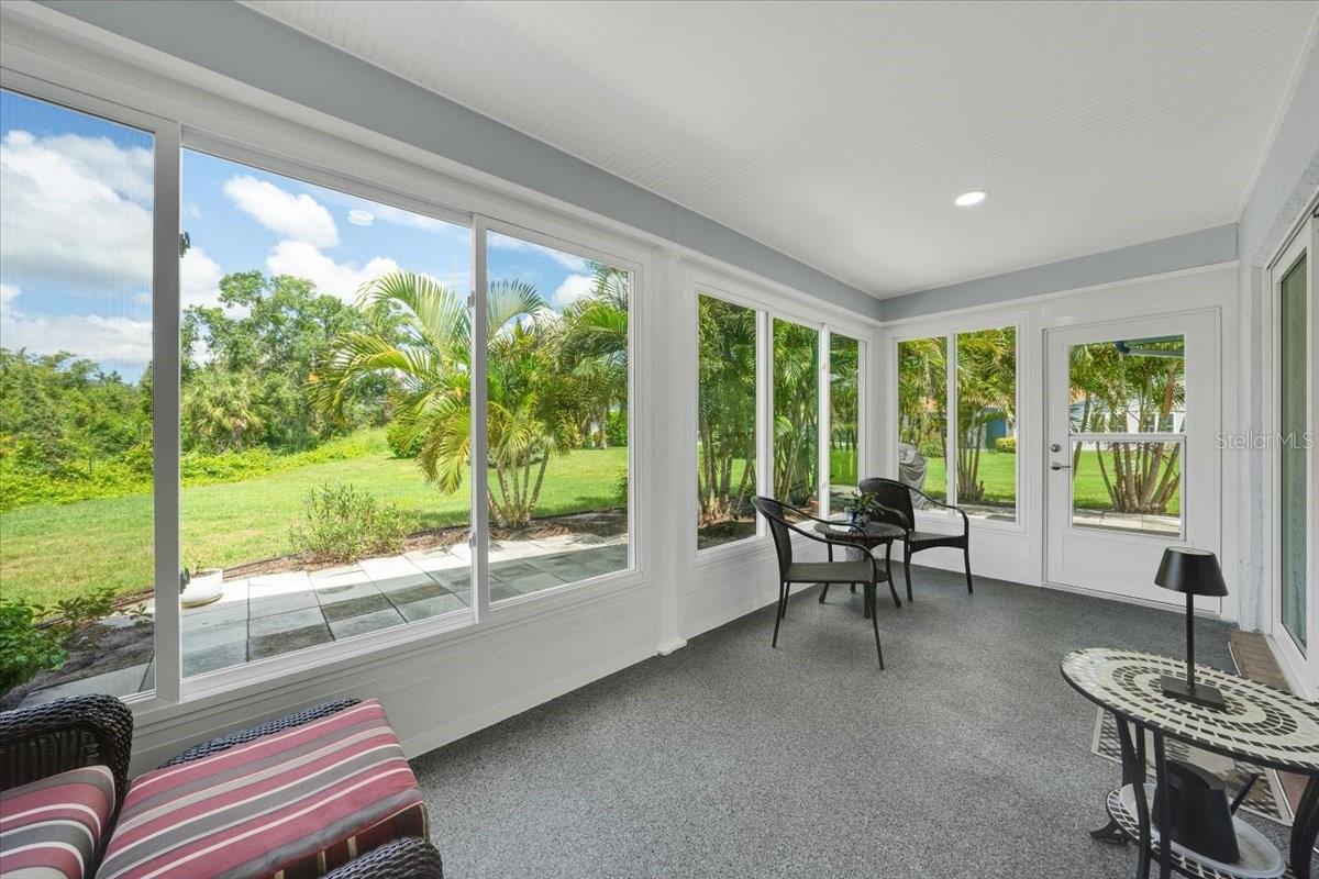 Epoxy flooring, recessed lighting and a sunset view with privacy