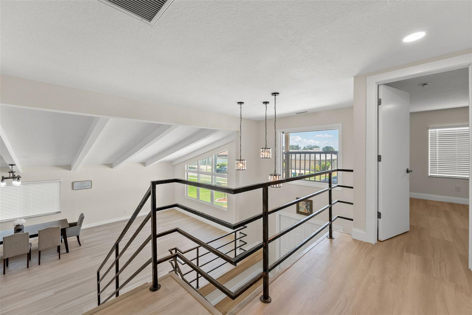Stairway overlooking dining/great room