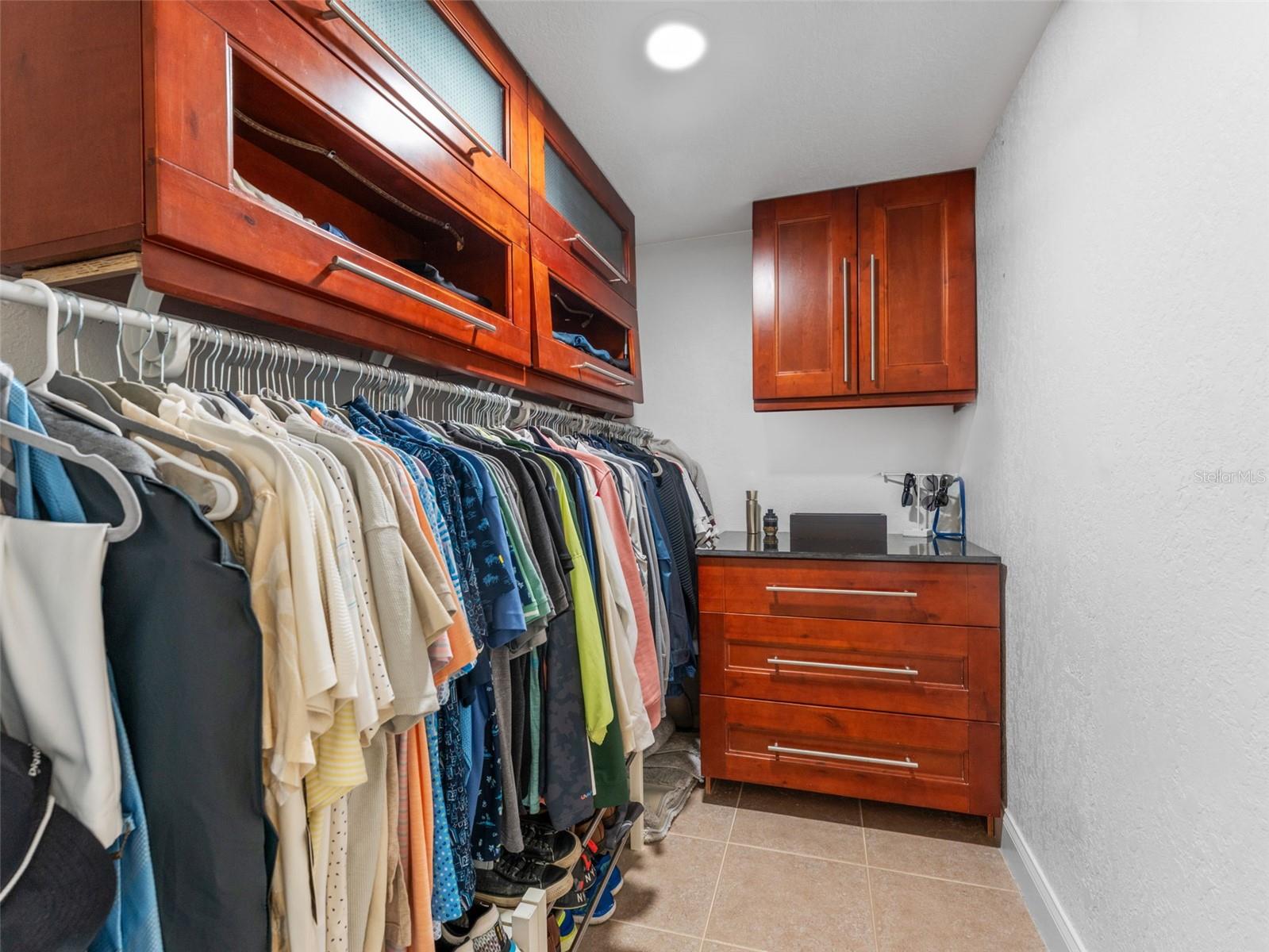 Two of two Custom Closets in the Primary Suite