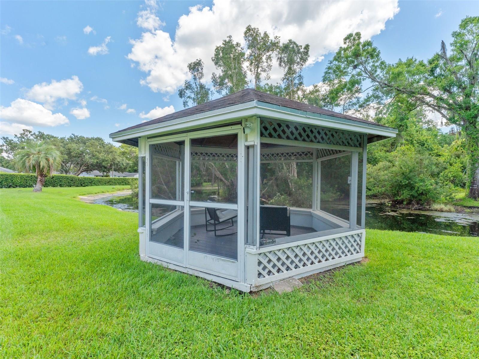Screened, lit and fanned waterfront gazebo for enchanting evenings or lazy afternoons