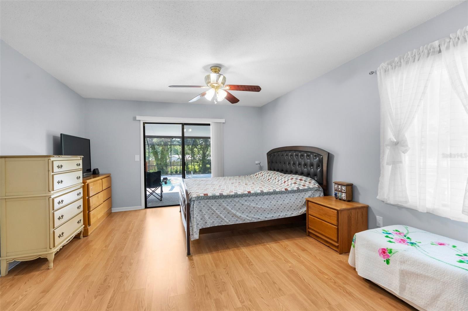 Primary Bedroom with access to the pool