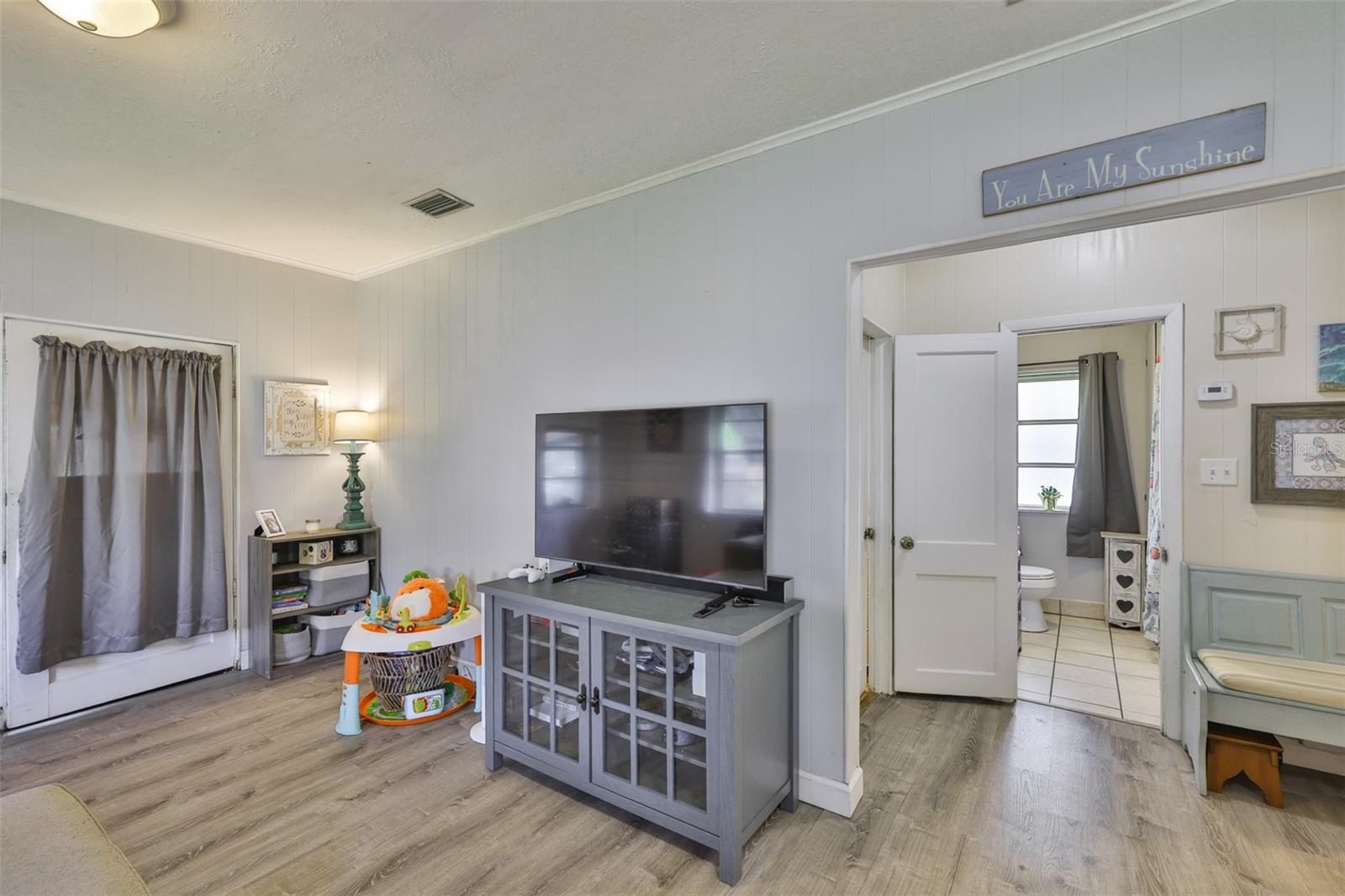 Front door with grey curtain
