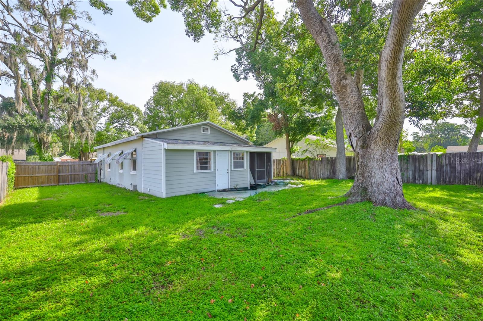 And lots of backyard space! Storage at right side of back of home