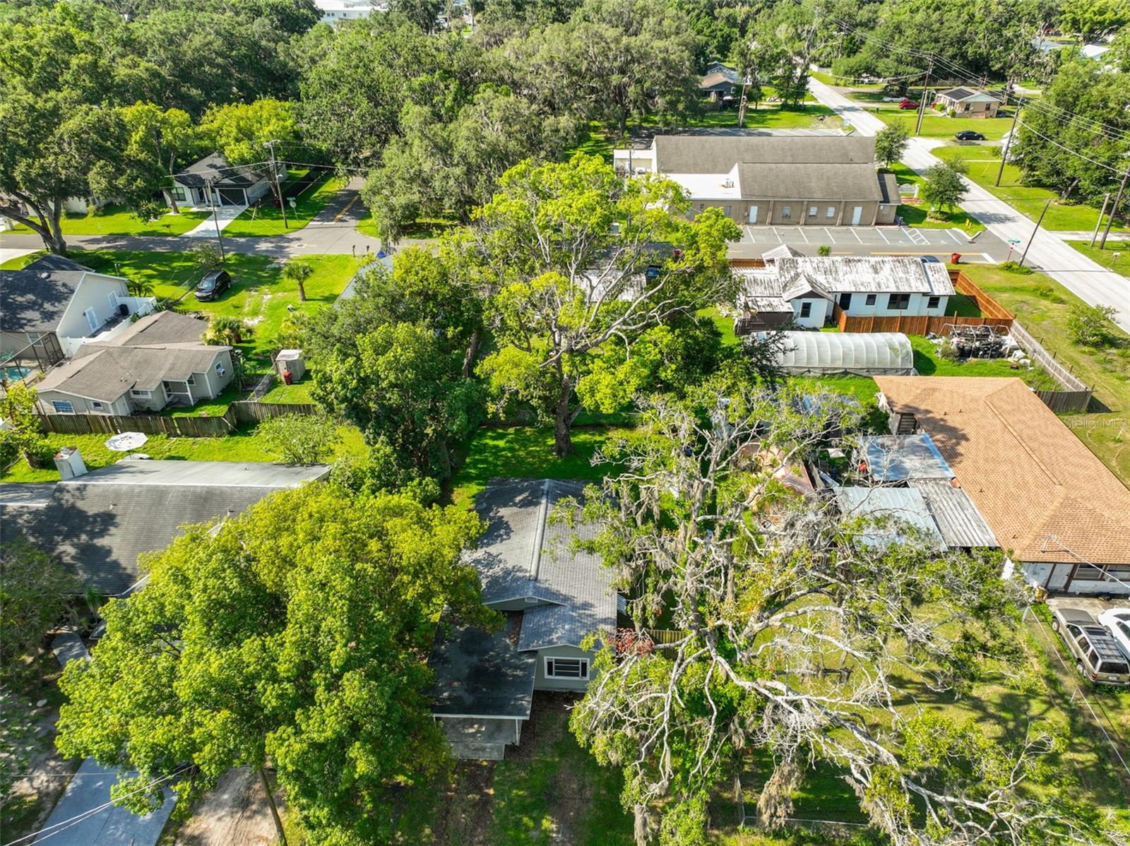 Tucked in the trees at bottom half of photo
