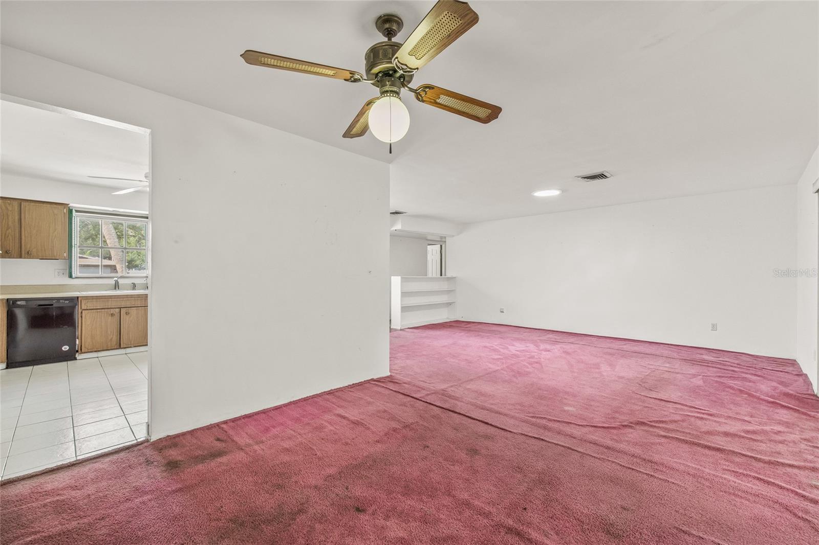 View from dining room to kitchen and living room