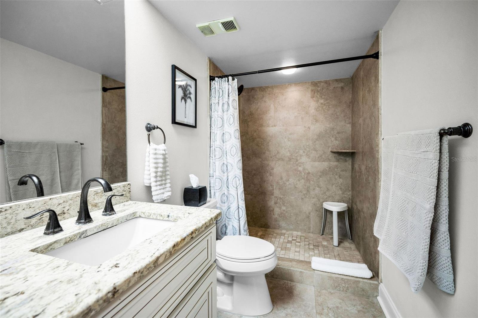 Walk in shower in the master bathroom