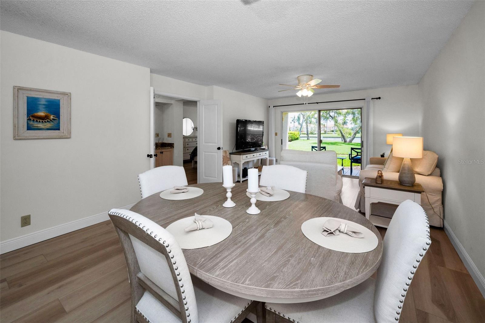 Another view of the dining and living area…doors in the middle of the picture are to the primary bedroom.