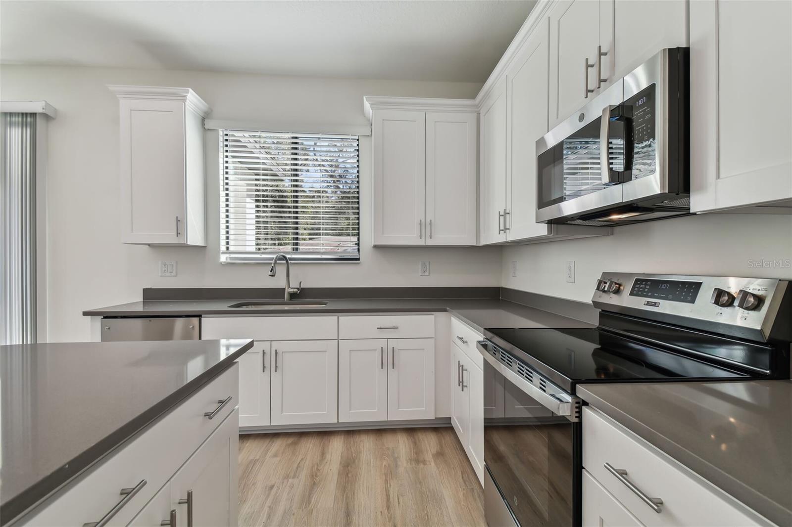 Photos are not the home listed, but same floor plan.