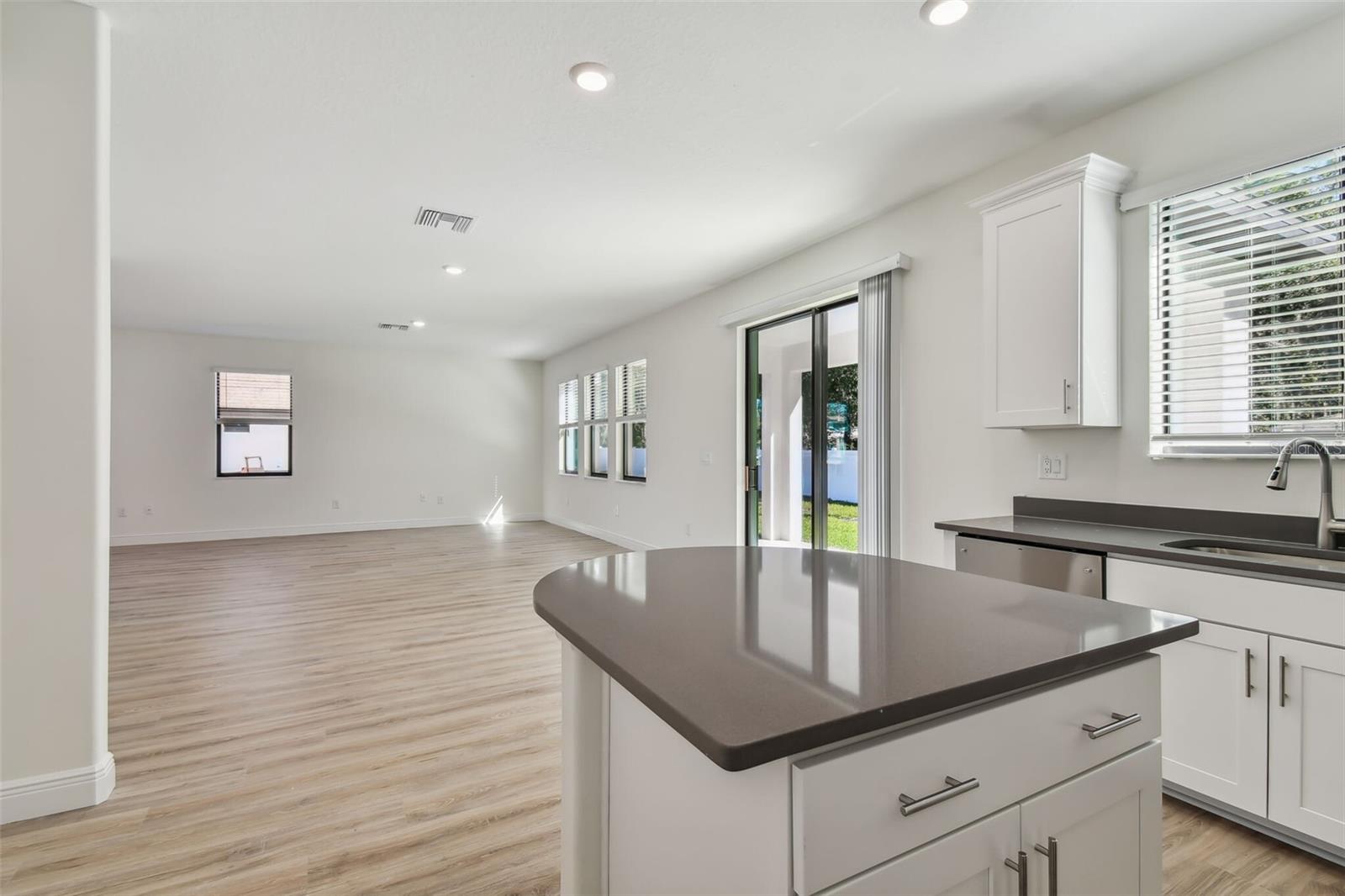 Photos are not the home listed, but same floor plan.