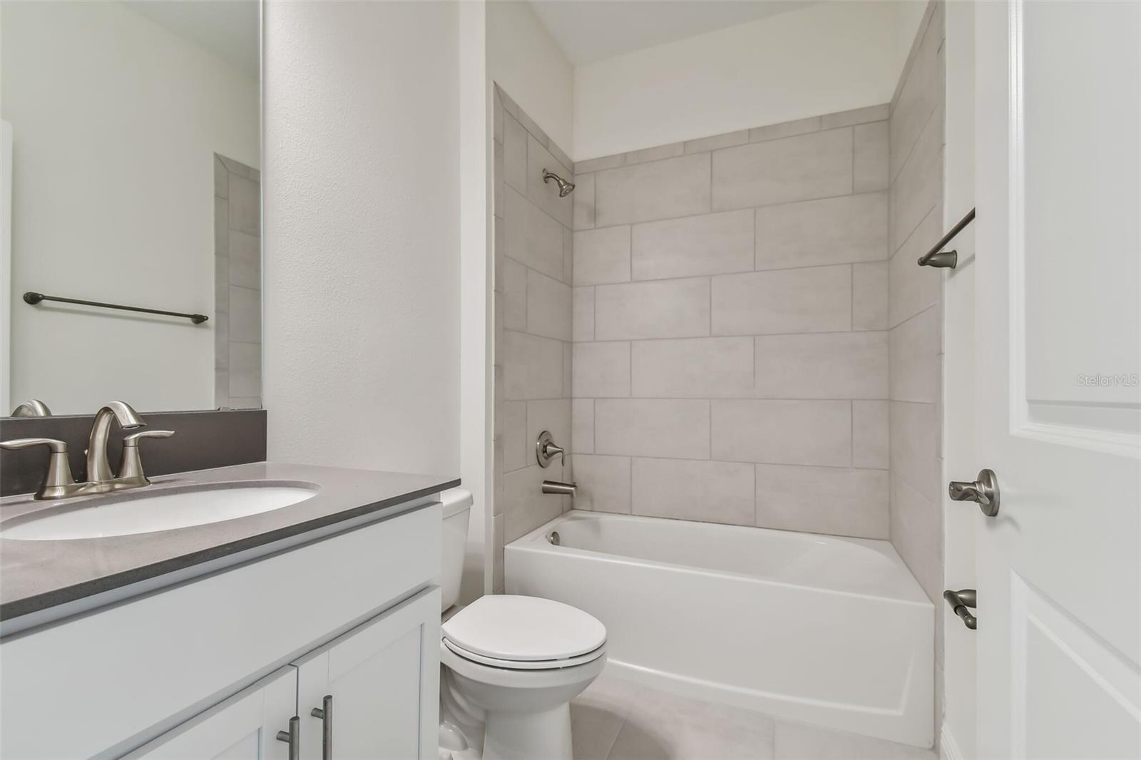 Photos are not the home listed, but same floor plan.
