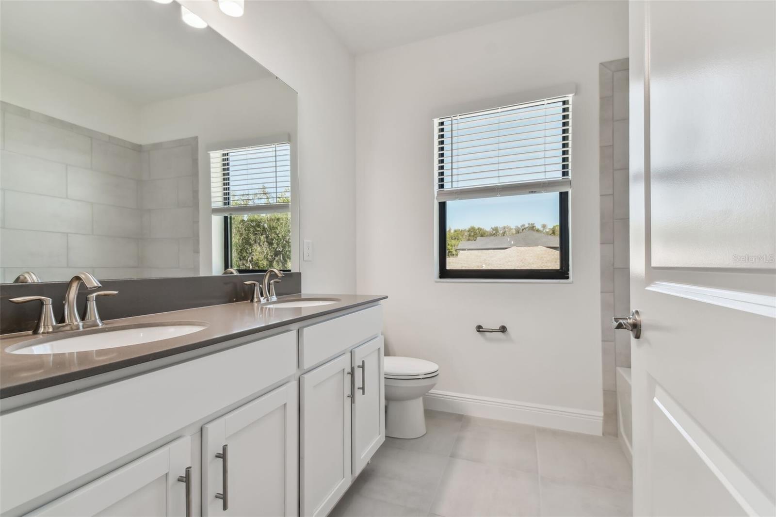 Photos are not the home listed, but same floor plan.
