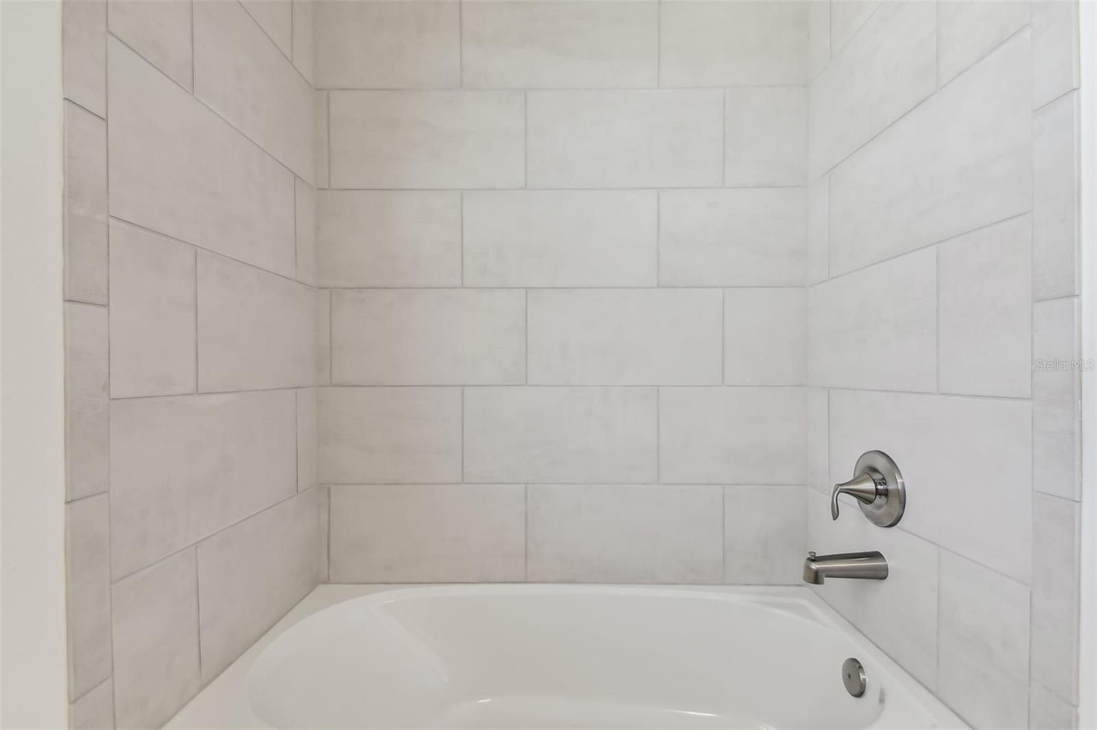 Photos are not the home listed, but same floor plan.